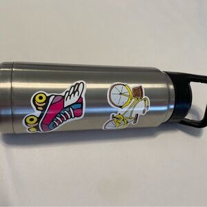 Yeti water bottle w/stickers.  Holds 24 oz. Measures 12 inches tall w/ top.